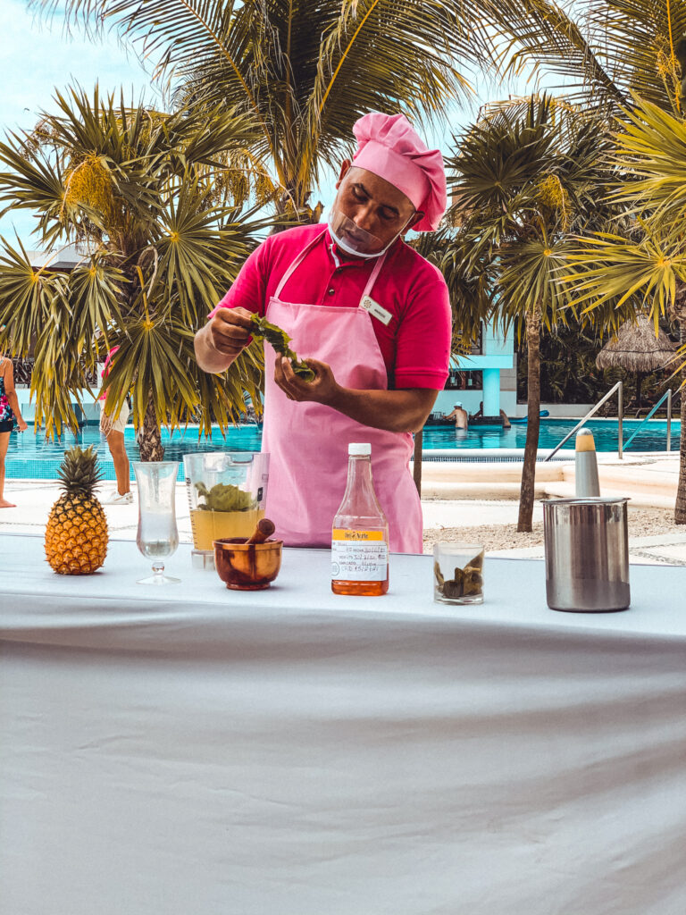 photo of staff member doing a tequila class for the blog Are Excellence Collection Hotels the best?