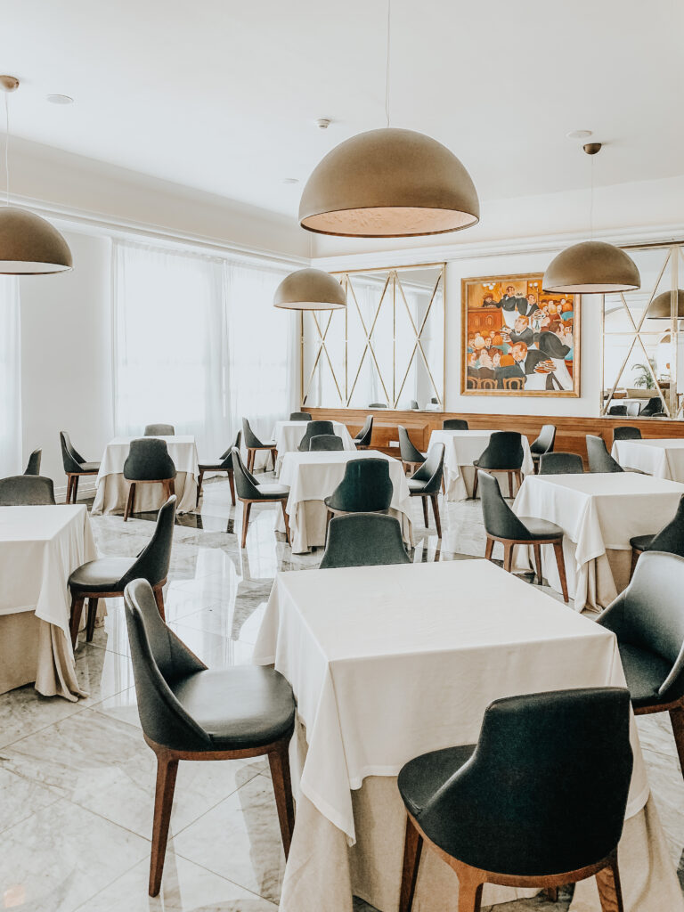 shot of restaurant tables inside Playa Mujeres for the blog Are Excellence Collection Hotels the best?