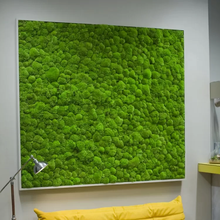 a photo of moss wall art by company PlantCare for the blog on home office design trends