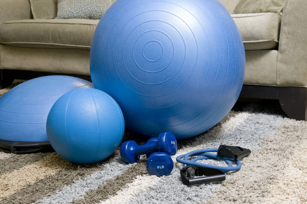 a photo of a products to buy for a budget-friendly home gym, like an exercise ball or jump rope